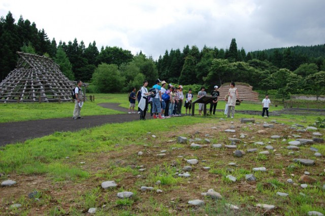 Visitors viewing the ruins at the Ofune Site