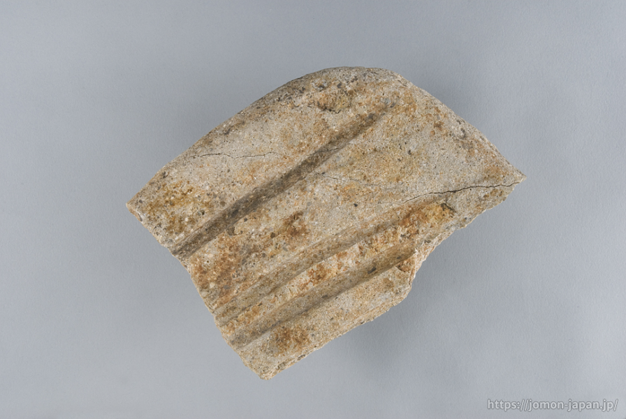 亀ヶ岡石器時代遺跡　玉を磨いた砥石