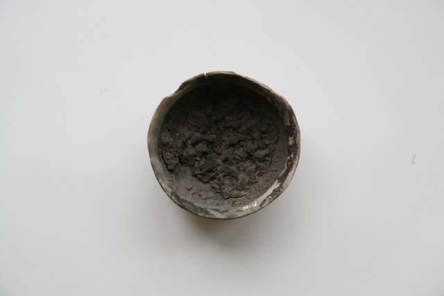Pottering containing lacquer