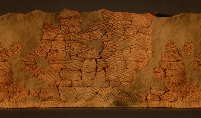 Wrap-around photo of Jomon pottery