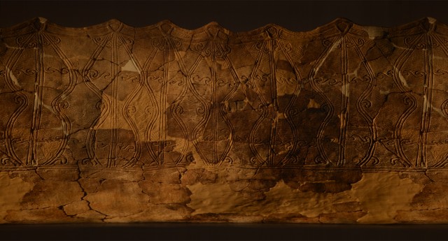 Wrap-around photo of Jomon pottery