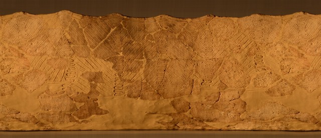 Wrap-around photo of Jomon pottery