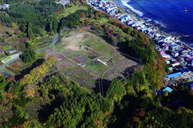 Full view of an earthwork mound, Kakinoshima Site